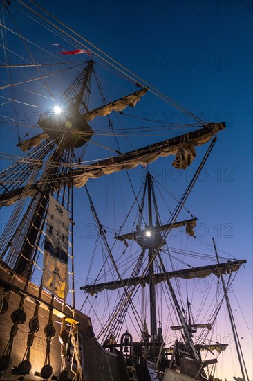 Old boat in the promenade of Muelle Uno in the Malagaport of the city of Malaga