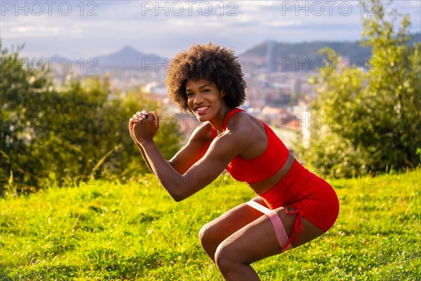 Fitness with a young black girl with afro hair