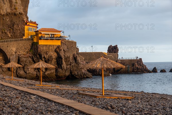 Umbrellas on the beach at Ponta do Sol