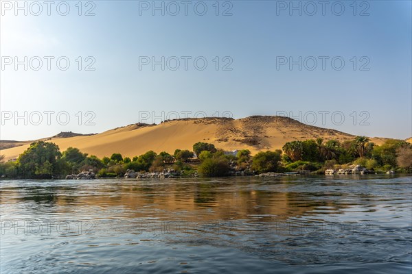 Small towns and ancient temples navigating the Nile River in Aswan city. Egypt