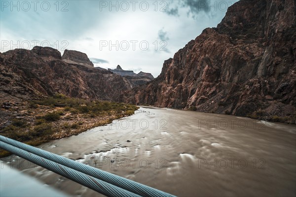 Long exposure on a cloudy afternoon of the Colorado River on the Bright Angel Trailhead route in the Grand Canyon. Arizona