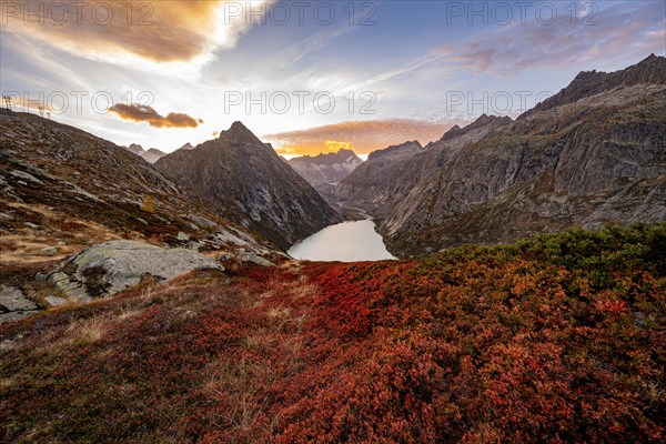 Autumn atmosphere at Lake Grimsel in the Swiss Alps with Zinggenstock