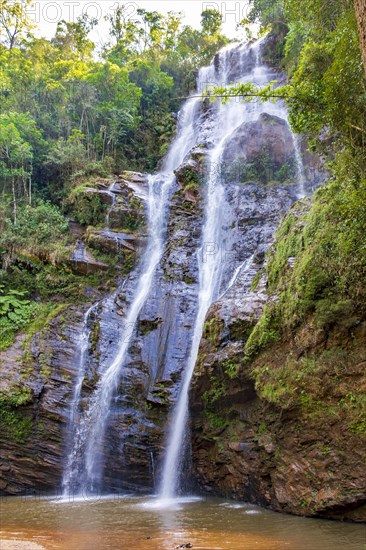 Beautiful waterfall in a remote location in the middle of the rainforest in the state of Minas Gerais in Brazil