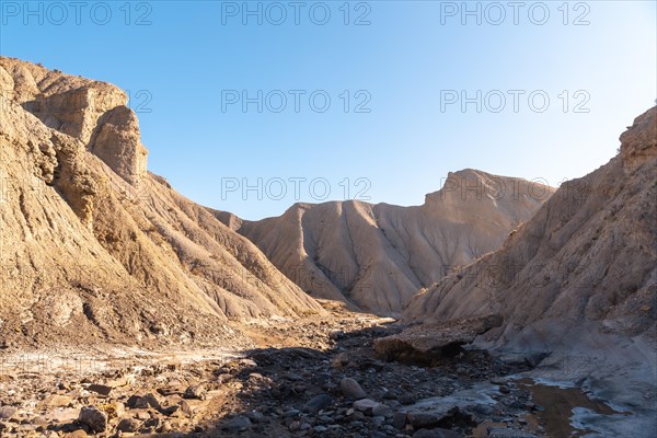 Incredible landscape at the Travertino waterfall and Rambla de Otero in the Tabernas desert one spring afternoon