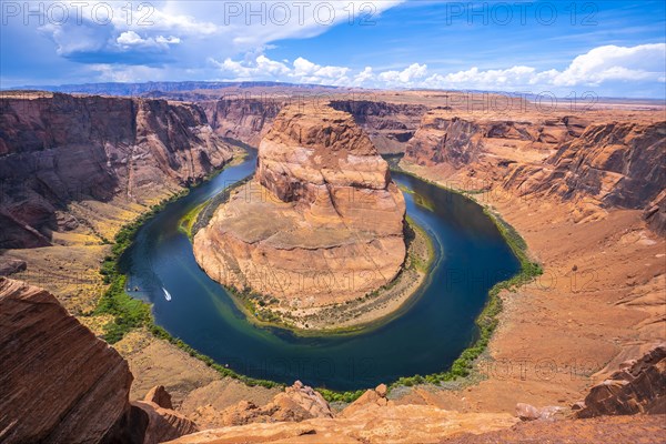 The impressive Horseshoe Bend and the Colorado River in the background