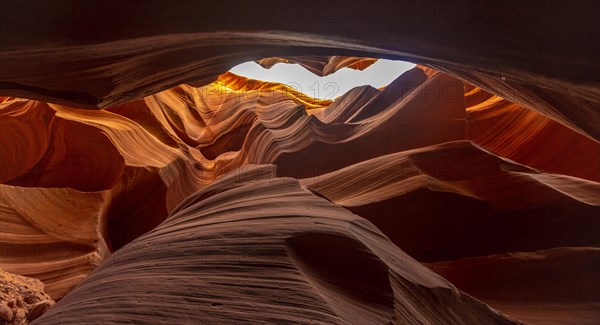 The beautiful curves in the stones of Lower Antelope and the blue sky above in Arizona. United States