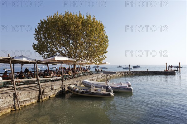 Idyllic harbour and pier on the lakeshore