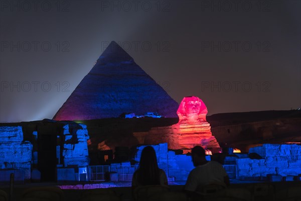 Sound and light show at the beautiful pyramids and sphinx of Giza. Night in the city of Cairo. Africa