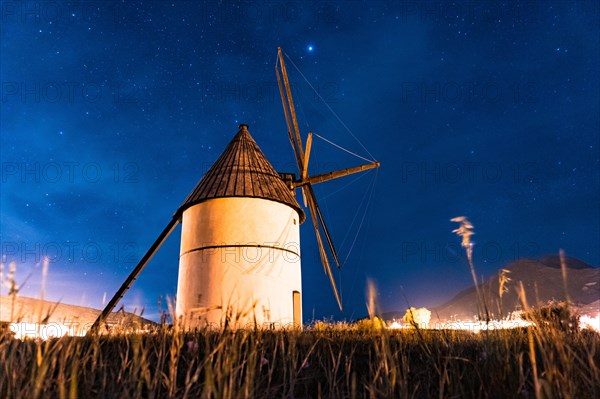 Molino del Pozo de los Frailes at night in the town of San Jose in Cabo de Gata