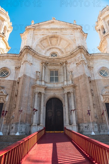 Entrance with red carpet of the Santa Iglesia Catedral in the city of Cadiz. Andalusia