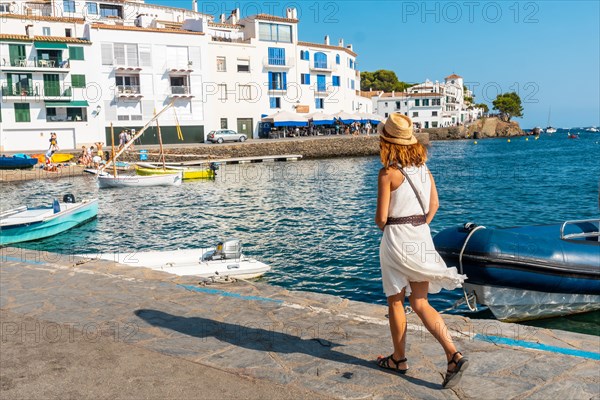 A young woman on vacation along the coast of Cadaques