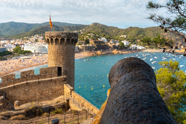 Beautiful war cannon in the castle of Tossa de Mar in summer