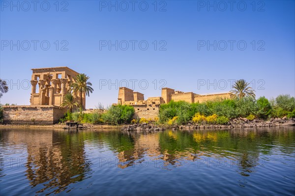 The beautiful temple of Philae and the Greco-Roman buildings seen from the Nile river