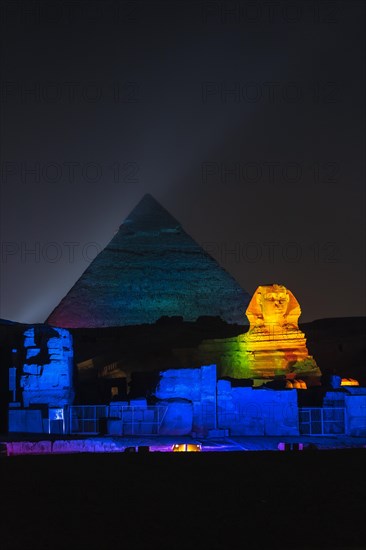 Sound and light show at the beautiful pyramids and sphinx of Giza. Night in the city of Cairo. Africa