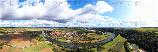 The Mainschleife near Volkach winds through the valley and is surrounded by fields and vineyards. Volkach