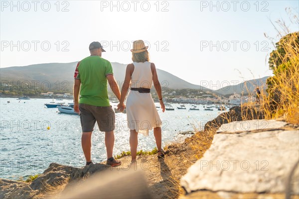 A couple on vacation in Cadaques enjoying the summer