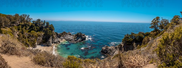 Panoramic of the Mcway Waterfall and its crystal clear water beach