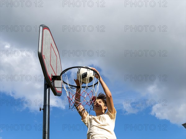 Basketball Jump with the ball to the basket and net