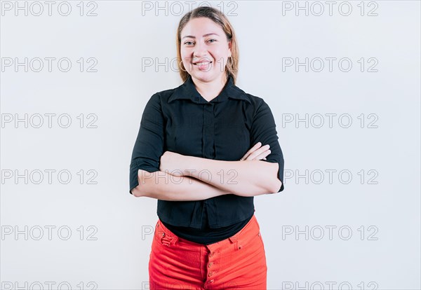 Attractive latin woman with arms crossed isolated. Portrait of beautiful latin girl with arms crossed. Nicaraguan woman on white background