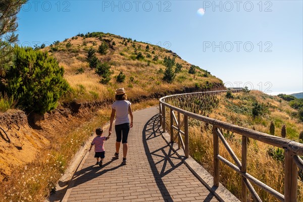 A mother with her son at the Miradouro do Paredao viewpoint