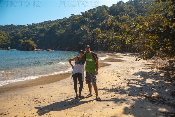 A couple on the beach of Puerto Caribe in Punta de Sal in the Caribbean Sea