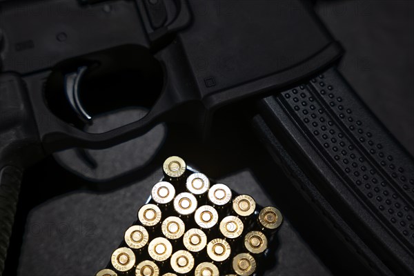 Modern Elegant Assault Rifle and Bullet on Grey Background in Switzerland