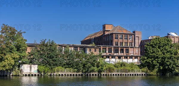 Vacant favrik building on the Spree in Berlin-Oberschoeneweide
