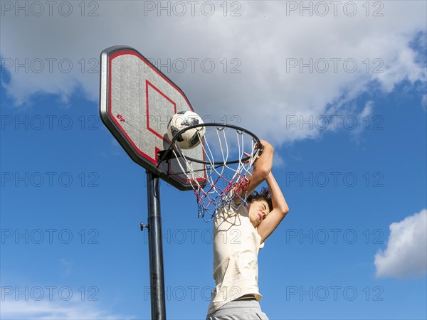 Basketball Jump with the ball to the basket and net