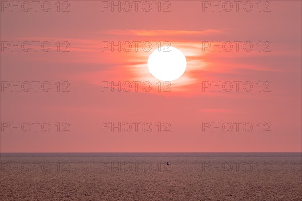 Sunset on the beach of De Panne