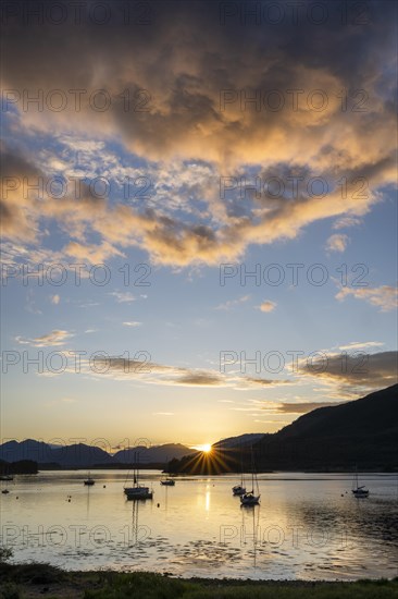 Sunset over the freshwater loch Loch Leven