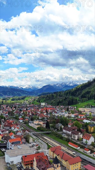 Aerial view of Immenstadt im Allgaeu with a view of the Alps. Immenstadt im Allgaeu