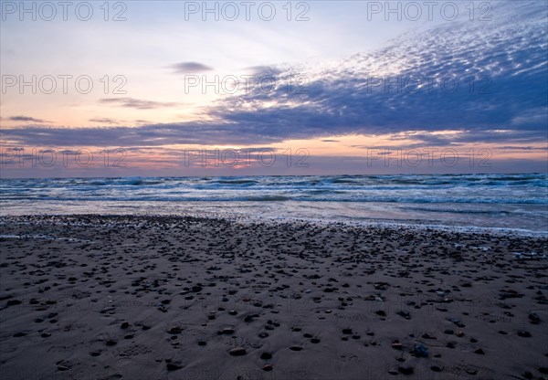 Evening atmosphere on the stony North Sea beach near Hirtshals