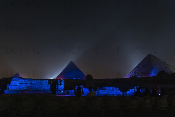 Sound and light show at the beautiful pyramids and sphinx of Giza. Night in the city of Cairo. Africa