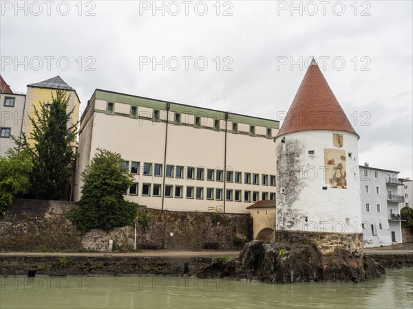 View over the Inn River to the Schaibling Tower at the Inn Quay