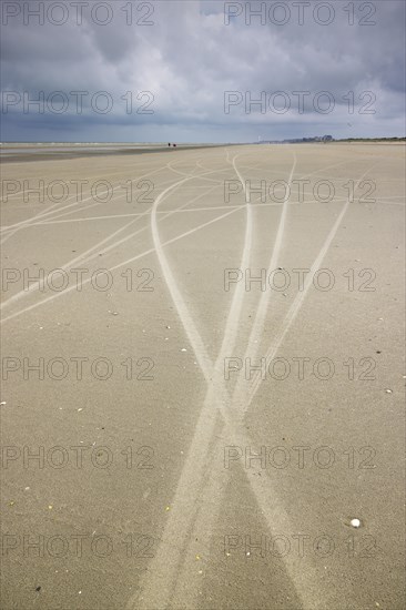Traces of beach sailors in the sandy beach