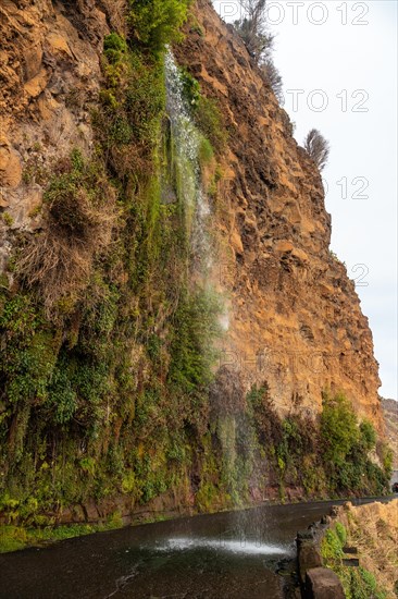 Waterfall that falls on the road called Anjos Waterfall