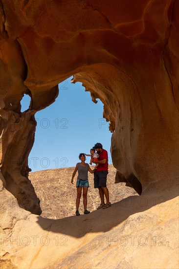 A family and their baby at the Mirador de la Penitas in the canyon of La Penitas