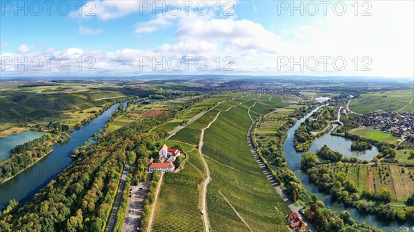 The Mainschleife near Volkach winds through the valley and is surrounded by fields and vineyards. Volkach