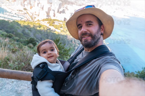 A father with his son in the Penon de Ifach Natural Park