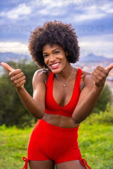 Fitness with a young black girl with afro hair