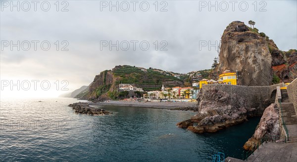 View of Ponta do Sol beach in summer from the seafront called Cais da