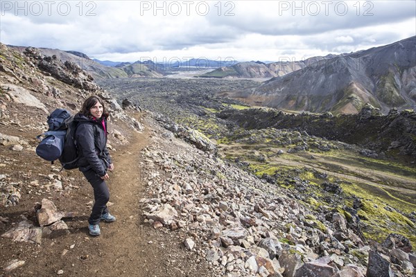 A young woman about to finish the 54 km trek from Landmannalaugar