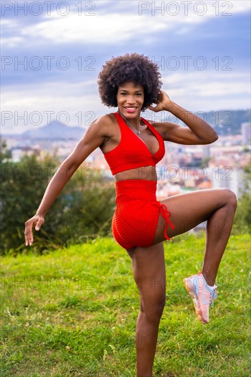 Fitness with a young black girl with afro hair