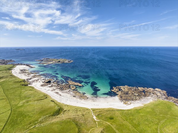 Aerial view of Traigh An T-Suidhe sandy beach on the north side of the Isle of Iona