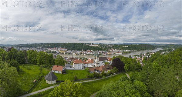 Aerial view of Pauline monastery and old town of Passau with Veste Oberhaus