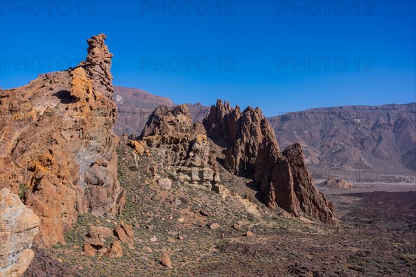 Downhill path in the Roques de Gracia and the Roque Cinchado in the natural area of Teide in Tenerife