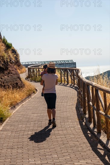 A mother with her son at the Miradouro do Paredao viewpoint