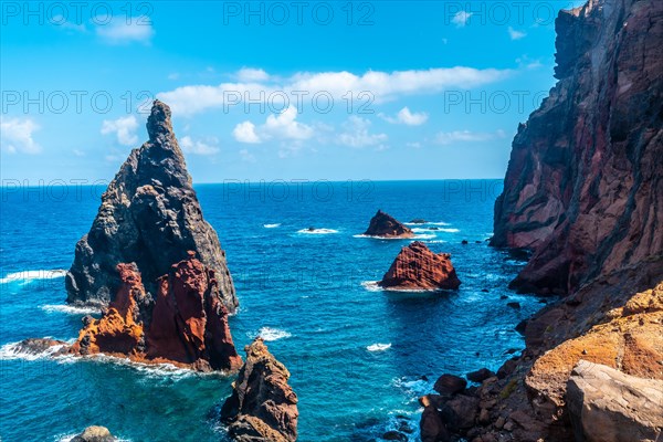 View from the viewpoint of the colorful rock formations at Ponta de Sao Lourenco