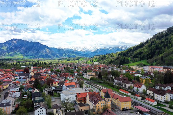 Aerial view of Immenstadt im Allgaeu with a view of the Alps. Immenstadt im Allgaeu