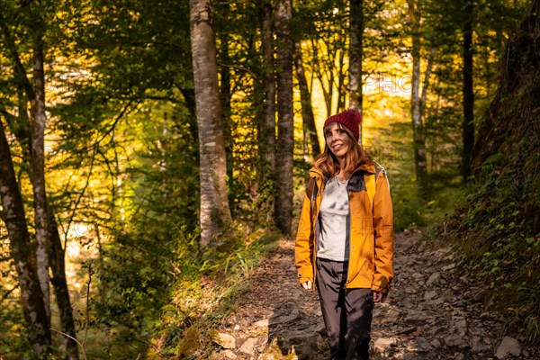 A young hiker on the trail to the Holtzarte suspension bridge